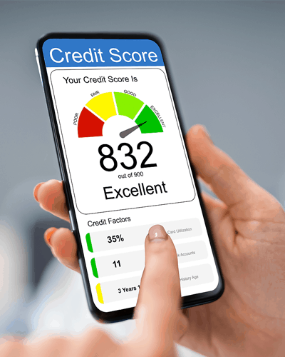 a picture a females hand holding a mobile phone showing a credit report in the app window